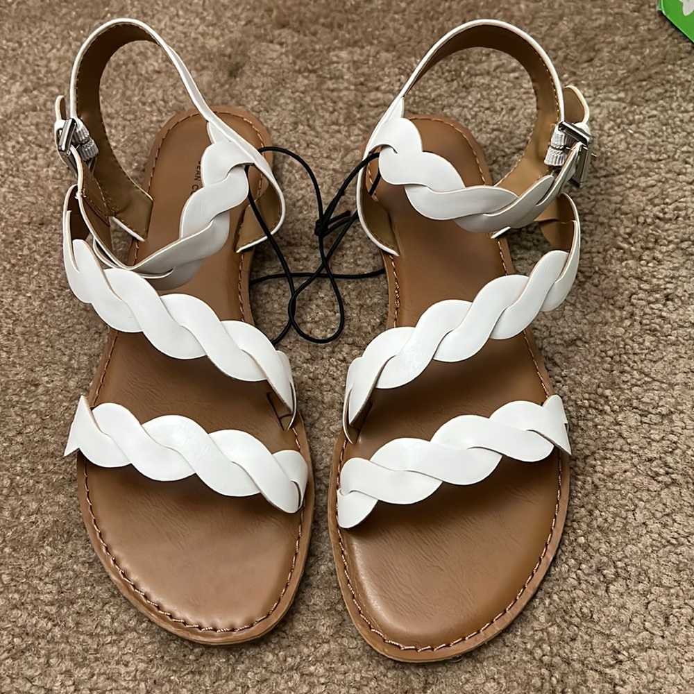 BRAND NEW! Sandals that’ve never been worn.